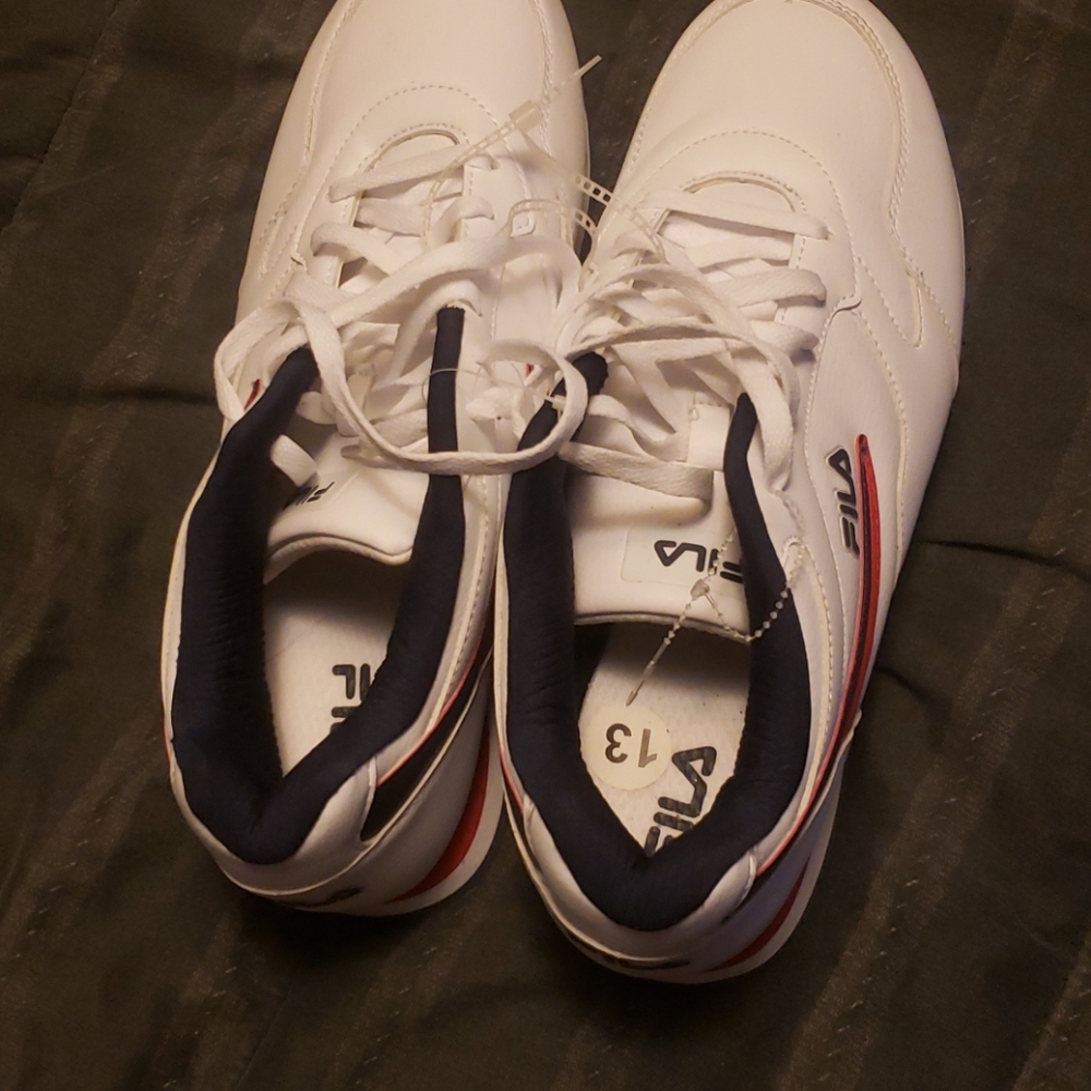 Never worn. Brand new Fila men's 13